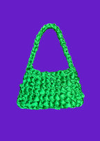 Bolso Sailor midori · bolso de asa media de ganchillo verde sobre fondo morado · Fūwa