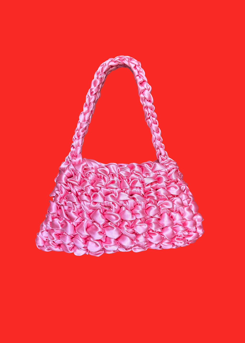 Bolso Sailor sakura · bolso de asa media de ganchillo rosa sobre fondo rojo · Fūwa