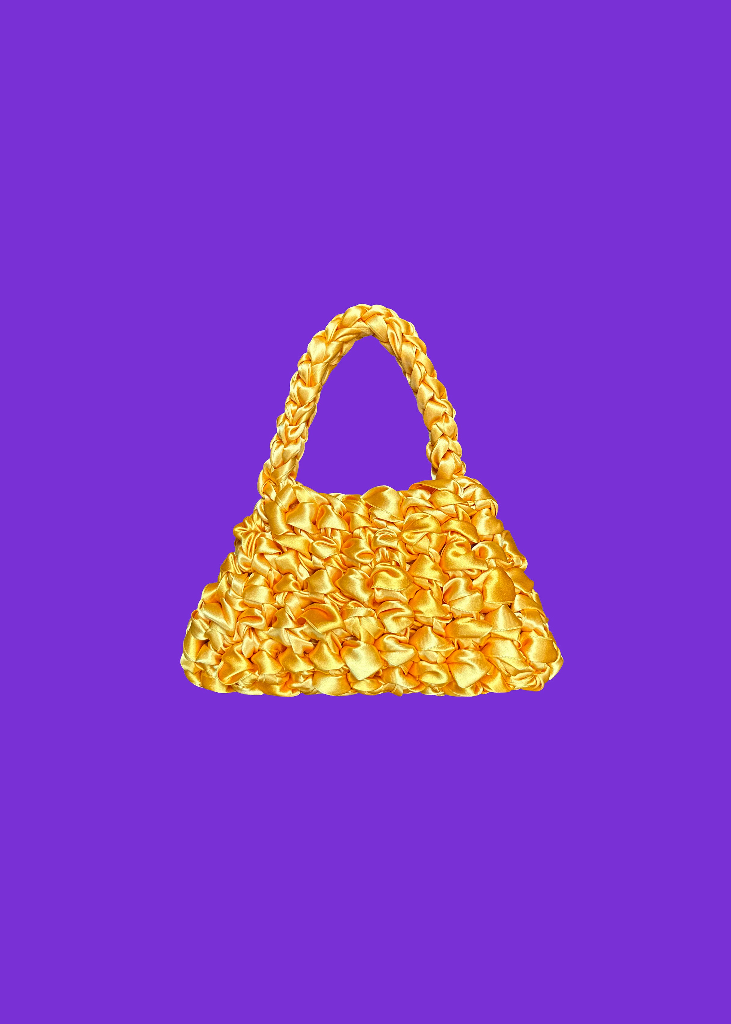 Bolso Sailor Mini Ki · bolso mini de ganchillo amarillo sobre fondo morado · Fūwa